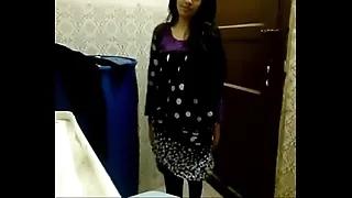 Indian Girl stripping in Hotelroom for her husband